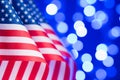 United States flags in a row over bokeh lights background with copy space Royalty Free Stock Photo