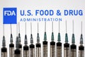 United States Food and Drug Administration FDA logo and medical syringes