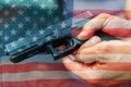 United States Gun Laws - Guns and weapons. A hand of man practicing firing using a Glock gun model at the shooting range. Fire Royalty Free Stock Photo