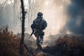 United States Navy special forces soldier in action during a tactical operation on a forest fire, Soldier walking through a smoky