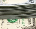 United States one dollar bill is sticking out from a stack of money 2 Royalty Free Stock Photo