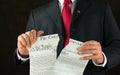 United States politician ripping up and shredding The Constitution representing corruption and injustice Royalty Free Stock Photo