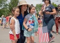 U.S. Rep. Tulsi Gabbard poses with little girls during the July 4 parade in Amherst, New Hampshire, USA, on July 4, 2019