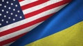 United States and Ukraine two flags textile cloth, fabric texture Royalty Free Stock Photo