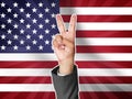 United States Victory Sign Hands with Two Fingers and Waving Flag Royalty Free Stock Photo