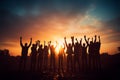 United team Silhouettes raise hands in joyous celebration together