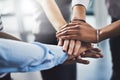 United teams excel the best. Closeup shot of a group of businesspeople joining their hands together in a huddle. Royalty Free Stock Photo