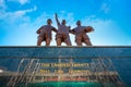 The United Trinity bronze sculpture at Old Trafford Stadium in Manchester, UK