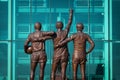 The United Trinity bronze sculpture at Old Trafford Stadium in Manchester, UK