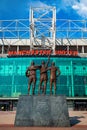 The United Trinity bronze sculpture at Old Trafford Stadium in Manchester, UK