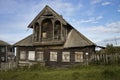 Abandoned wooden two-storey house. Wooden