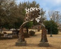 `Unity Arch` by Ai Qui Hopen in Dr. Glenn Mitchell Memorial Park in McKinney, Texas.