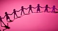 Unity and Equality Concept with Pink Paper Cutout People Chain Royalty Free Stock Photo