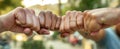 The unity of hands displaying friendship and connection in a vibrant outdoor setting..AI generated image Royalty Free Stock Photo
