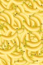 Universal beautiful yellow background from ripe bananas. Abstract banana collage. Concept of healthy food, vegetarianism