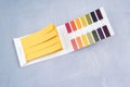 Universal indicator paper with acidic testing Royalty Free Stock Photo