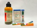 Universal indicator solution, the pH indicator and Closeup of a box of pH indicator test strips Royalty Free Stock Photo