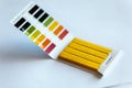Universal litmus pH test with color scale Royalty Free Stock Photo