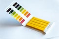 Universal litmus pH test with color scale on white Royalty Free Stock Photo