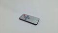 Universal Slim IR Wireless Remote Control for Digital LCD LED Display Panels Royalty Free Stock Photo