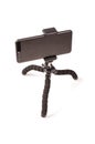 Universal smart phone tripod isolated on the white Royalty Free Stock Photo
