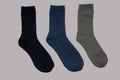 Universal warm socks on grey background. Royalty Free Stock Photo