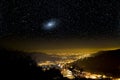 The Universe above city lights. Royalty Free Stock Photo