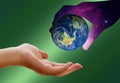 Universe giving planet Earth to humans Royalty Free Stock Photo