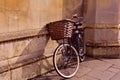 University bicycle near the wall in sunset Royalty Free Stock Photo