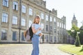 University blonde student girl outdoor at campus with laptop Royalty Free Stock Photo