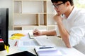 University / college student doing homework in classroom, education concept Royalty Free Stock Photo