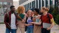 University friendship funny speaking emotional joyful diverse people teens high school pupils happy multiracial friends Royalty Free Stock Photo