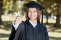 University, graduation and portrait of girl with thumbs up on campus for success, award and certificate ceremony