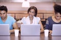 University, laptop and portrait of woman in library for online research, studying and learning. Education, college and Royalty Free Stock Photo