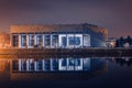 The University Library in Wroclaw on the banks of the Odra River, illuminated at night Royalty Free Stock Photo