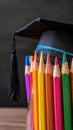 University milestone Colorful pencils with graduation hat, education concept