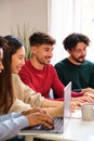 University student studying with his colleagues together at shared flat. Royalty Free Stock Photo