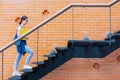 University student walk climb stairs step up in school campus to rise higher success smart woman concept Royalty Free Stock Photo