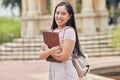 University student, woman and tablet for campus portrait with smile, backpack and walking with pride. Gen z girl