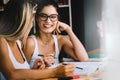 University student girl bored, frustrated and overwhelmed by studying homework Royalty Free Stock Photo