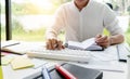 University student working in library with homework after study class Royalty Free Stock Photo