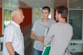 university students in corridor with professor Royalty Free Stock Photo
