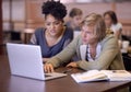 University, students and people in library on laptop for online research, studying and learning. Education, college and Royalty Free Stock Photo