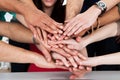 University students piling hands Royalty Free Stock Photo