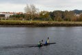 University students during rowing training on the Pontevedra River in Galicia