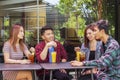 University students spending leisure time in cafe