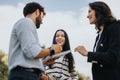 University students study and discuss subjects outdoors, preparing for exams and working on projects. Royalty Free Stock Photo