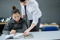 University students study hard and listen to teachers for their lessons with special lectures in the columns of math class