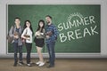 University students with text of summer break Royalty Free Stock Photo