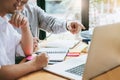 University students using laptop meeting for research homework i